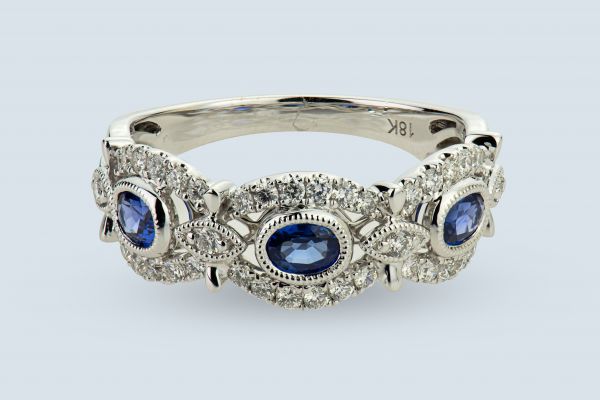 18kt White Gold Round Diamond and Blue Oval Sapphire Band (Recently Sold)